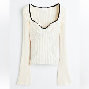 Elegant Cream Ribbed Sweater with Black Edging
